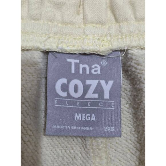 Aritzia Sweatpants Y2K TNA Graphic Cozy Fleece Cream 2XS A003777 - Picture 5 of 13